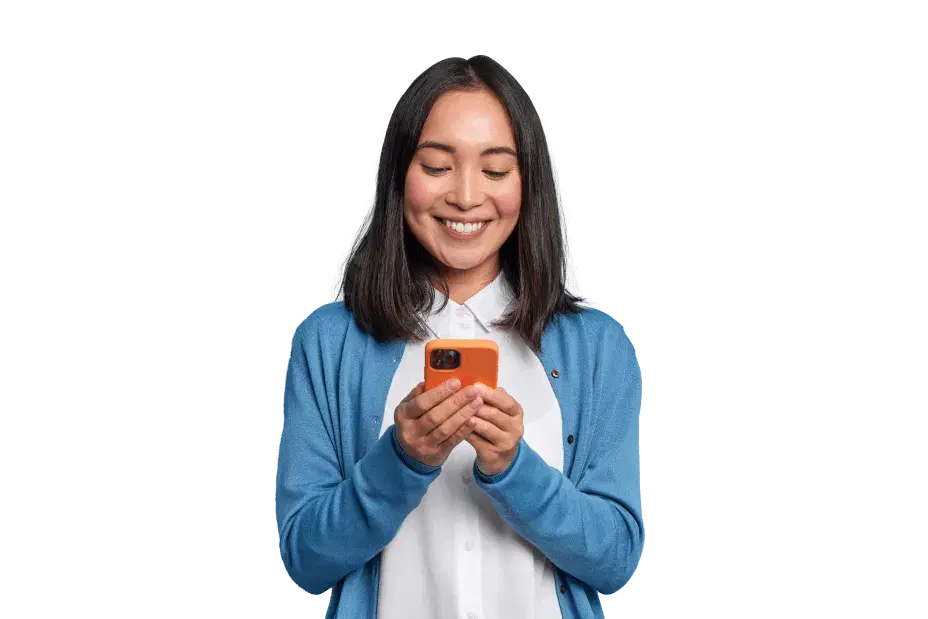 Woman using phone and smiling